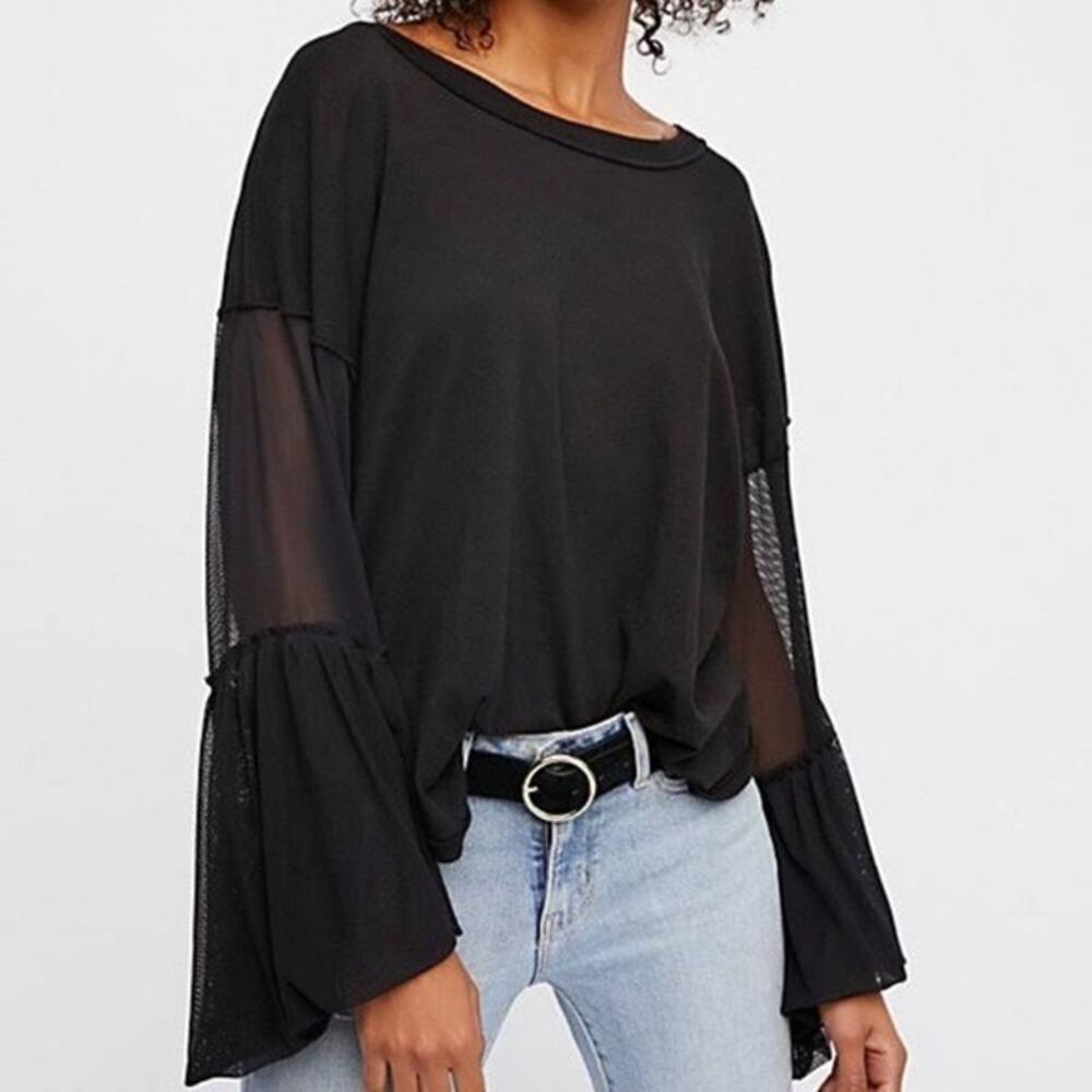 Free People “Still Got It” black mesh bell sleeve top.